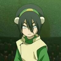 Toph en un estadio, en posición de pelea